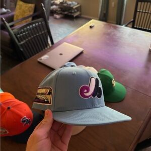 New Era Light Blue Baseball Cap with Purple and Black Logo 7 1/8